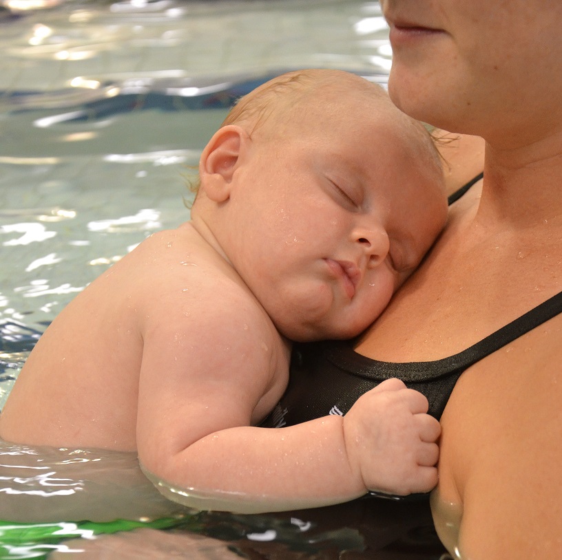 newborn baby swimming